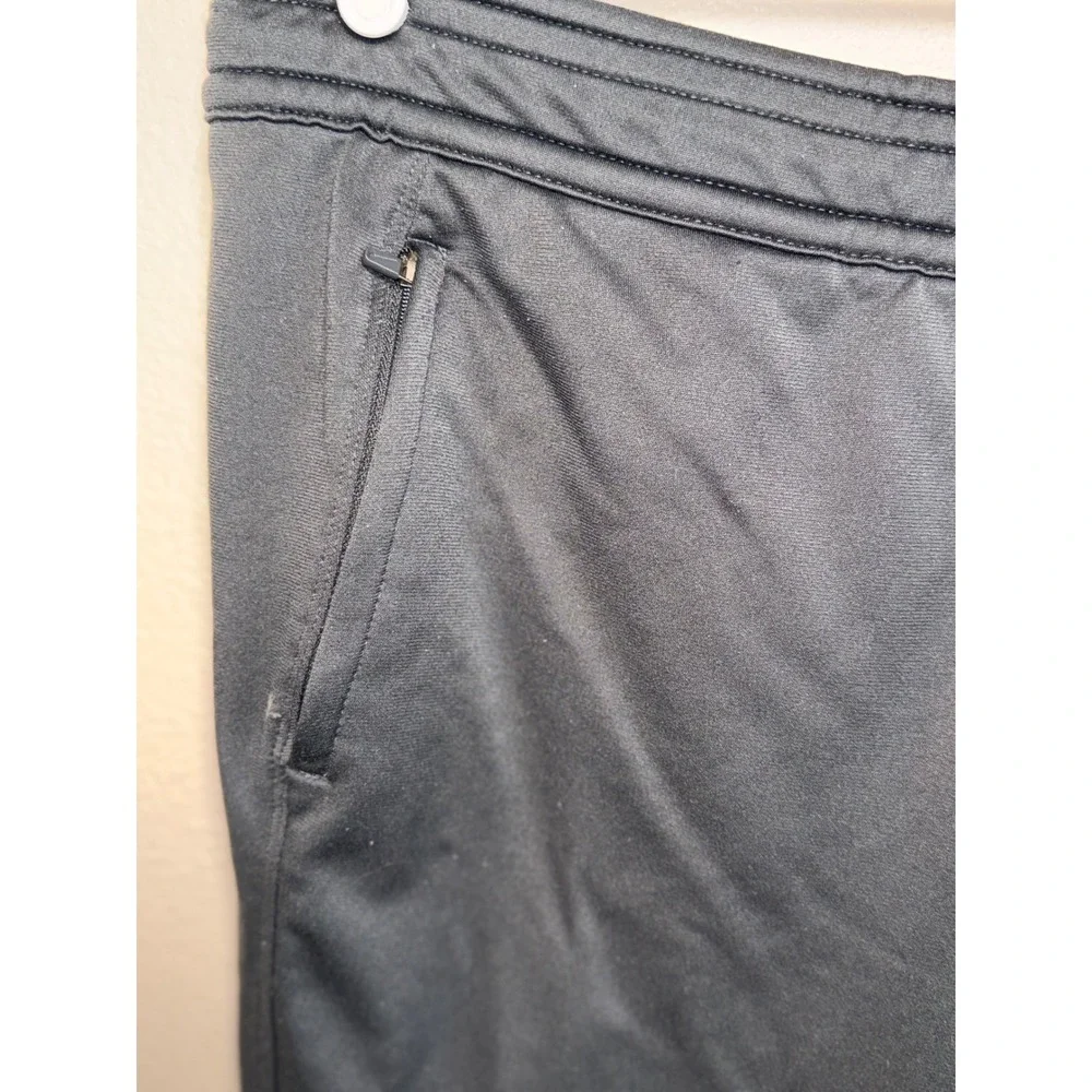 Nike Dri-FIT Women Black Cropped Athletic Joggers Zipper Pockets Orange Swoosh L